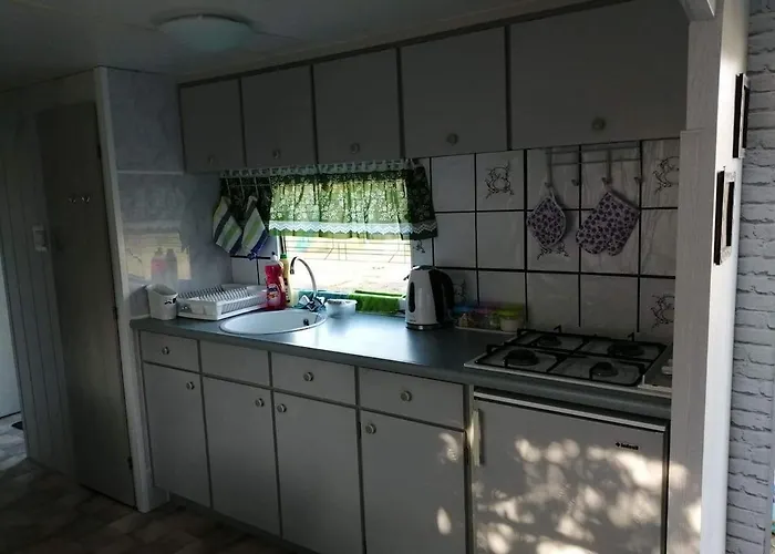 U Ewy Деревянный коттедж